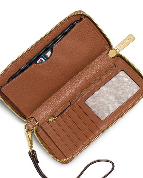 michael kors wallet for phone|michael kors multifunction wallet.